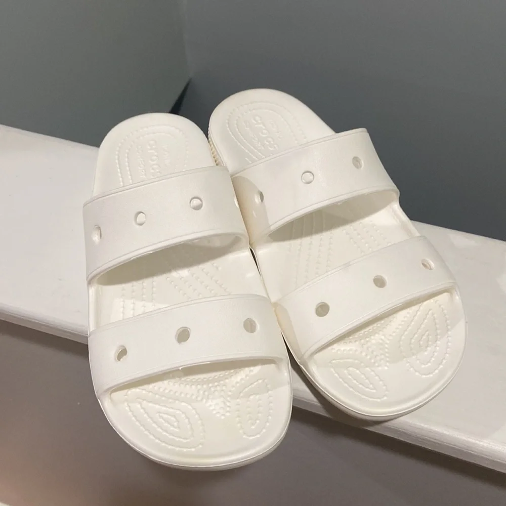 CROCS White CROCS Slide Sandals men's 7 women's 9 worn once 14 holes for charms